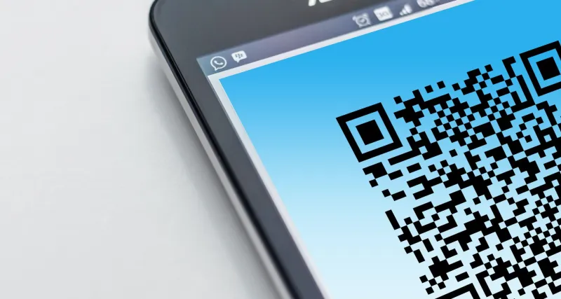 QR Codes e NFC em Brindes Corporativos: A Ponte Entre o Mundo Físico e o Digital que Sua Marca Ainda Não Explorou